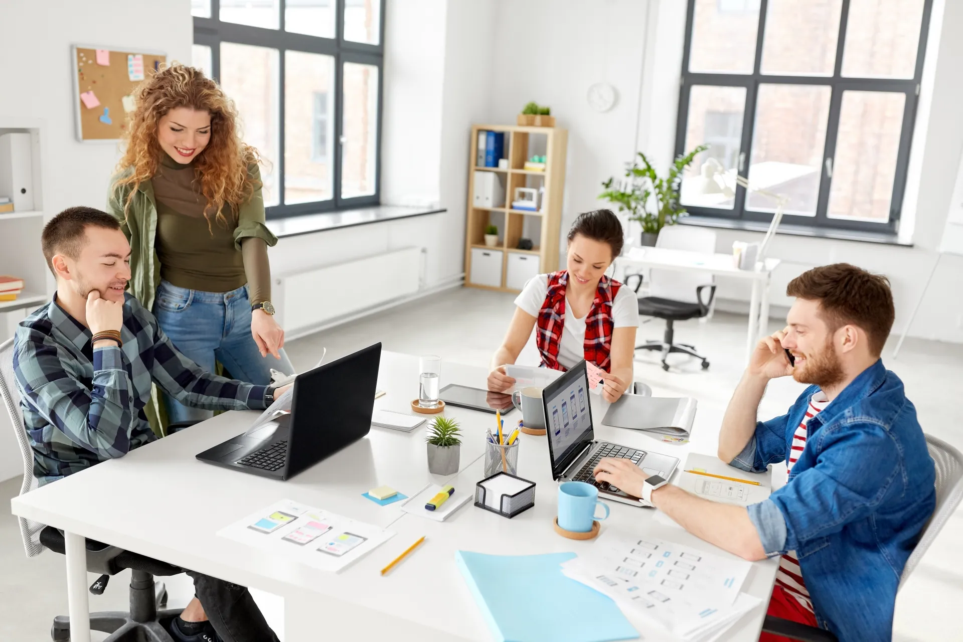 business, technology and people concept - creative team or designers working on user interface at office